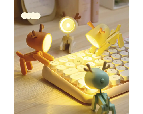 Dekoratívne LED stolné lampičky v tvare psa na klávesnici