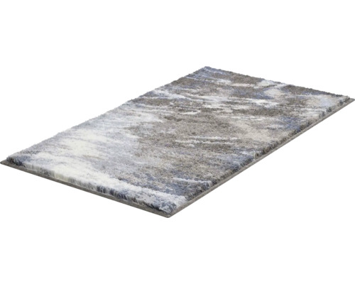 Obdĺžnikový koberec s abstraktným vzorom