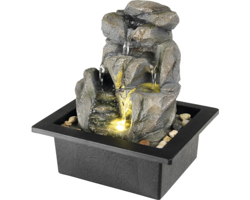 Dekoratívna izbová fontána so vzhľadom kameňa a osvetlením
