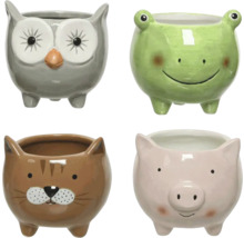 Štyri kvetináče v tvare zvierat: sova, žaba, mačka a prasa.