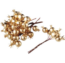 Dekoratívne zlaté bobule na vetvách