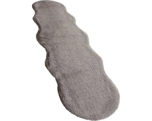 Sivý lem postele z ovčej kožešiny