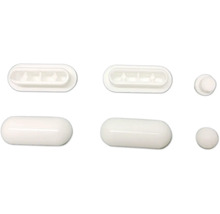 Rôzne biele plastové klzáky na nábytok