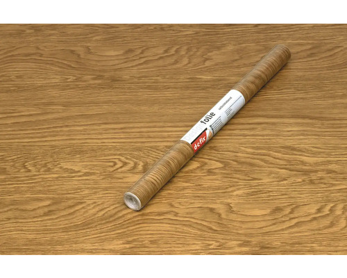 Dekoračná fólia s dreveným vzhľadom na drevenom povrchu