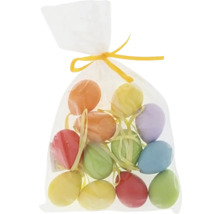 Dekoratívne veľkonočné vajíčka v priehľadnom obale so stuhou
