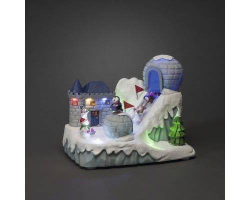 Dekoratívna zimná krajina s hradom, iglu, tučniakmi a osvetlením
