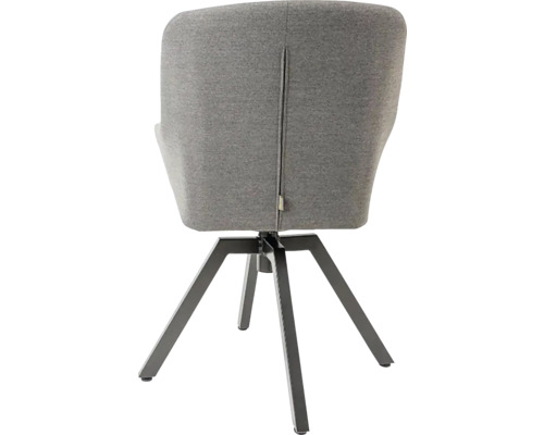 Pohľad zozadu na otočnú jedálenskú stoličku s látkovým poťahom a kovovým rámom