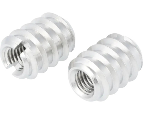 Dve kovové závitové vložky