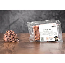 Balené psie krmivo a porcia psieho krmiva