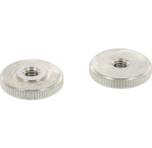 Dve kovové ryhované matice