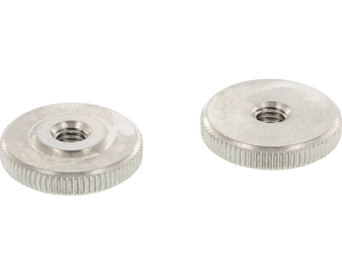 Dve kovové ryhované matice