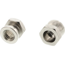 Dve kovové krycie matice