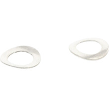 Dve kovové pružné podložky