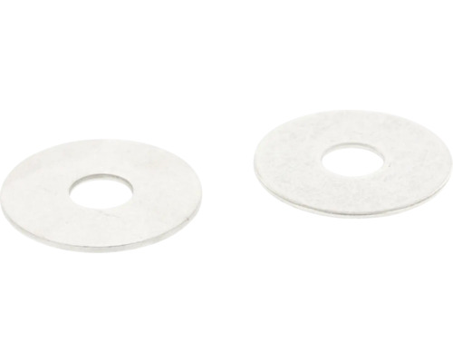 Dve kovové podložky s otvorom uprostred