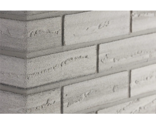 Obkladový pásik rohový Elastolith NEBRASCA 24x7,1 cm šedý farebný Detail rohu muriva s tehlami