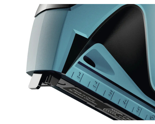 Detailný pohľad na zošívačku s hĺbkovým dorazom a metrickou stupnicou.