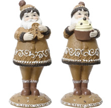 Dve figúrky Santa Clausa z polyresinu držiace medovníkového mužíčka a muffin, ako slávnostná dekorácia