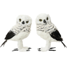 Dve dekoratívne sovie figúrky s perím a tmavými akcentmi