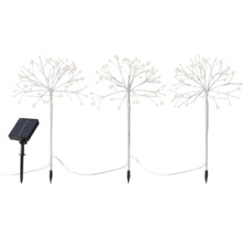 Tri solárne lampy v tvare gúľ s LED svetlami a solárnym panelom.