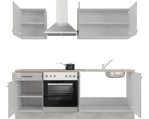 Moderná kuchynská linka s drezom, sporákom, digestorom a úložným priestorom