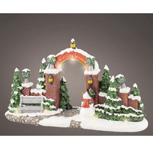 Osvetlená vianočná dekoratívna scéna s oblúkom, stromami a snehuliakom