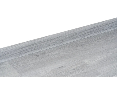 Plastová soklová lišta kanáliková Vancouver/Forsa 15x60x2500 mm Svetlá laminátová podlaha s dreveným vzhľadom.