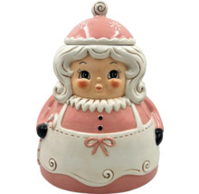 Dekoratívna dóza na zásoby s vianočným dizajnom ženy