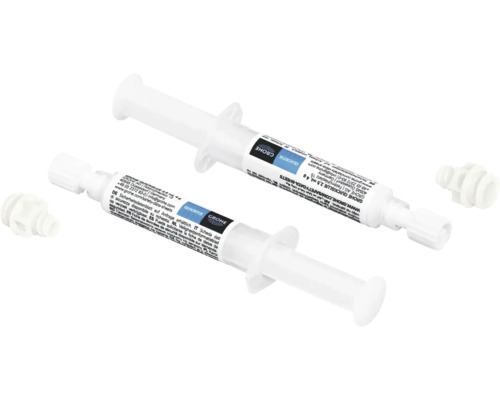 Dve tuby špeciálneho maziva Grohe Quickfix vo forme striekačiek s uzáverom