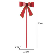 Červený záhradný zápich v tvare mašle z kovu, výška 30 centimetrov, šírka 7,5 centimetra, hĺbka 2 centimetre.