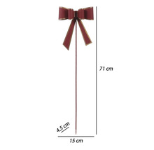 Dekoratívna červená mašľa na tyči so zlatým okrajom, výška 71 centimetrov, šírka 15 centimetrov, hĺbka 4,5 centimetra.