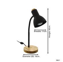 Stolná lampa z kovu s drevenou základňou. Výška 42 centimetrov, šírka tienidla 11 centimetrov, priemer základne 16 centimetrov.